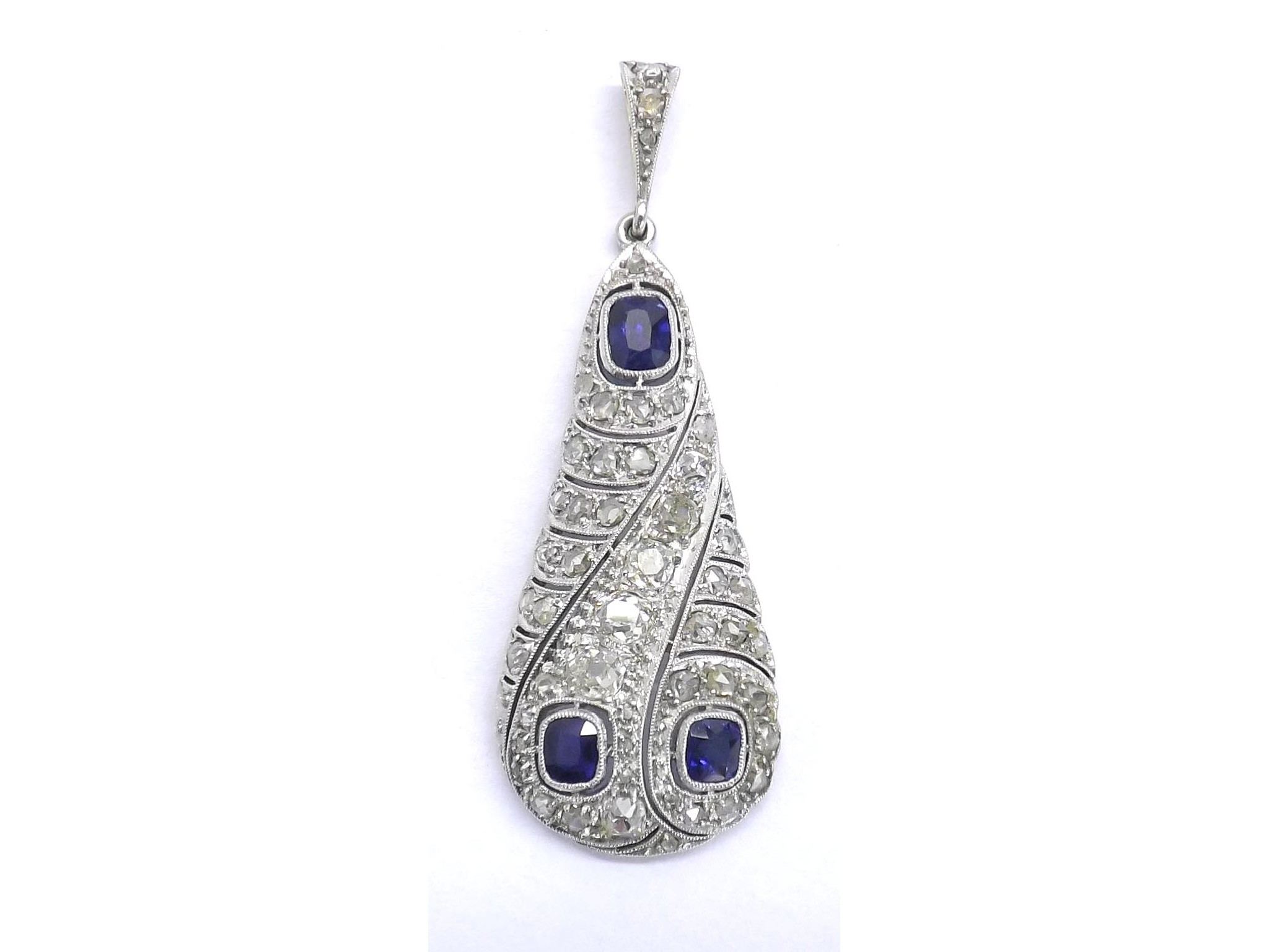 Appraisal: Attractive sapphire and diamond pear shaped pendant with three blue