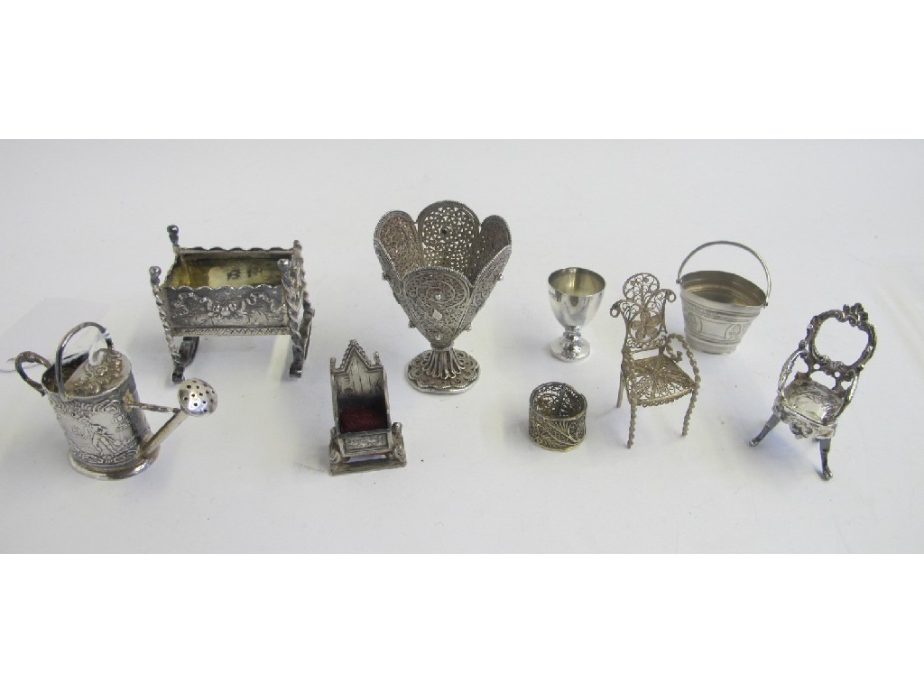 Appraisal: Lot comprising assorted miniature silver chairs watering can crib goblet