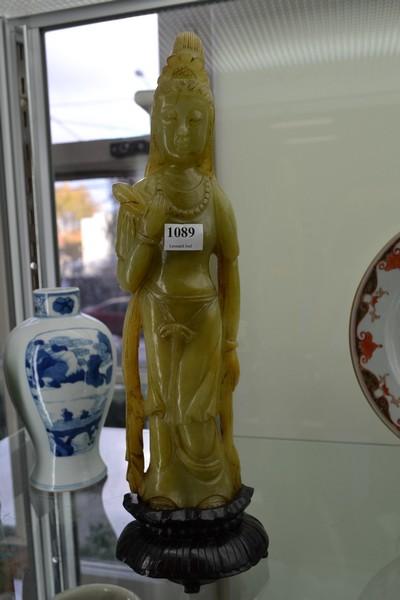 Appraisal: JADE GUANYIN ON WOODEN BASE