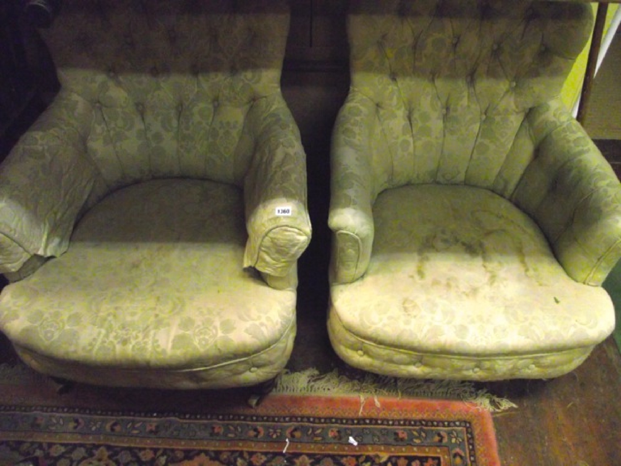 Appraisal: A pair of mid Victorian button back drawing room chairs