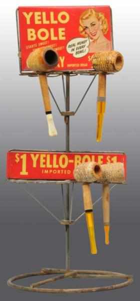 Appraisal: Yellow Bole Advertising Pipe Stand Description Includes four corn cob