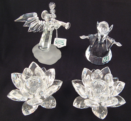 Appraisal: FOUR PIECES OF SWAROVSKI AUSTRIAN CUT CRYSTAL including two angels