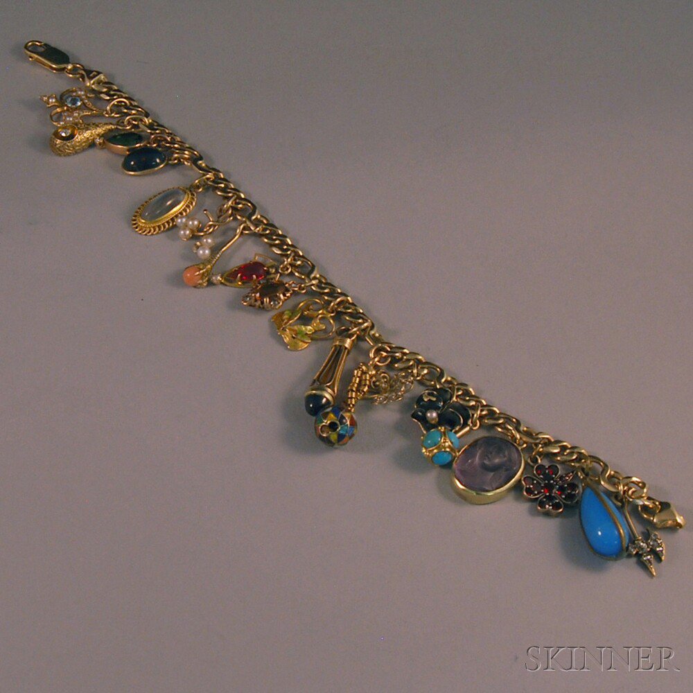 Appraisal: kt Gold Charm Bracelet hung with a variety of mostly