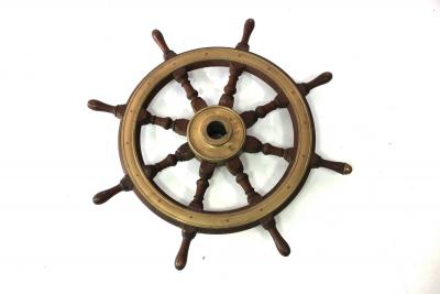 Appraisal: A brass mounted ship's wheel cm wide across handles