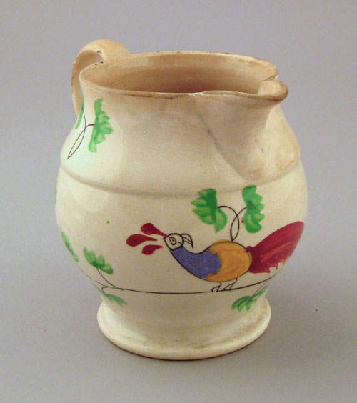 Appraisal: Pearlware creamer th c with peafowl decoration h