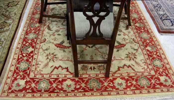 Appraisal: HAND KNOTTED ORIENTAL CARPET Indo-Chobi overall floral tracery on cream