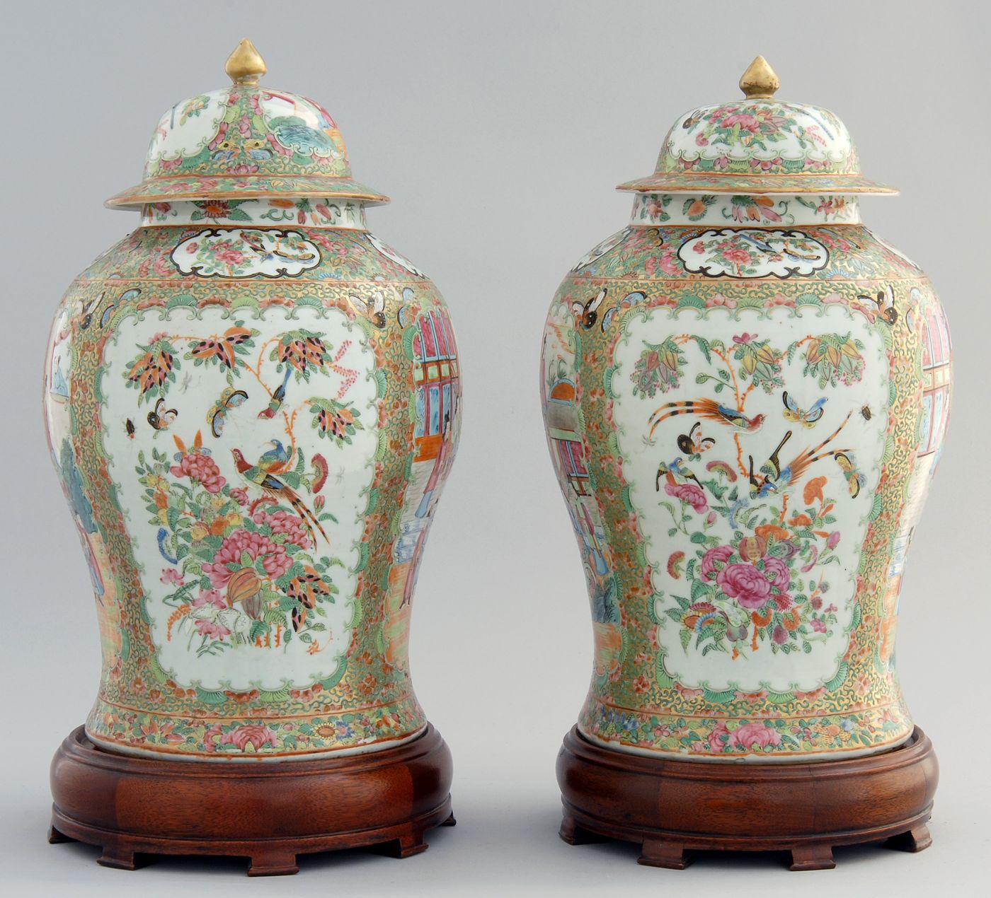 Appraisal: PAIR OF CHINESE EXPORT ROSE MANDARIN PORCELAIN COVERED TEMPLE JARS