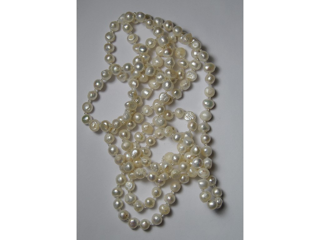 Appraisal: Opera length fresh water pearl necklace with small roundels between