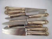 Appraisal: A set of six silver handled stainless bladed King's Husk