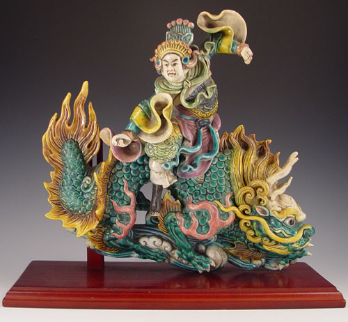 Appraisal: CHINESE POLYCHROME FIGURAL ROOF TILE Dragon with rider ''h x