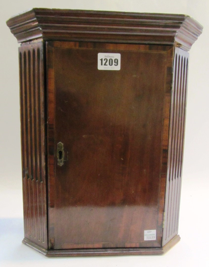 Appraisal: A miniature George III mahogany hanging corner cupboard cm wide