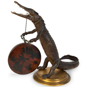 Appraisal: A Taxidermy Cayman Crocodile with Gong TH CENTURY Height x