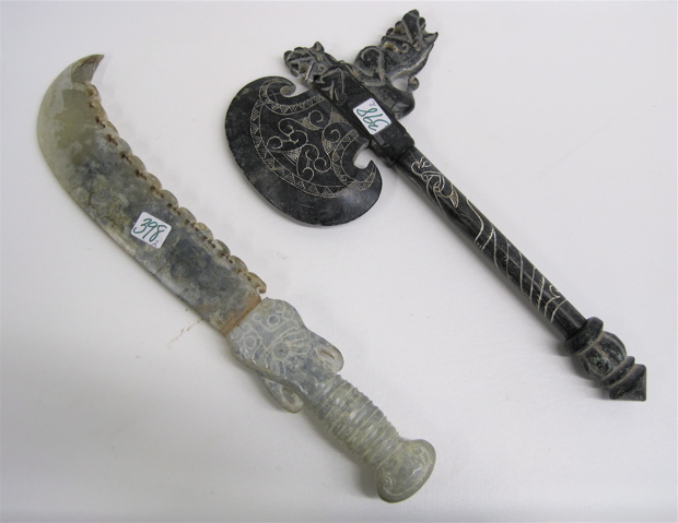 Appraisal: TWO CHINESE CARVED HARDSTONE DECORATIVE WEAPONS Dagger L together with