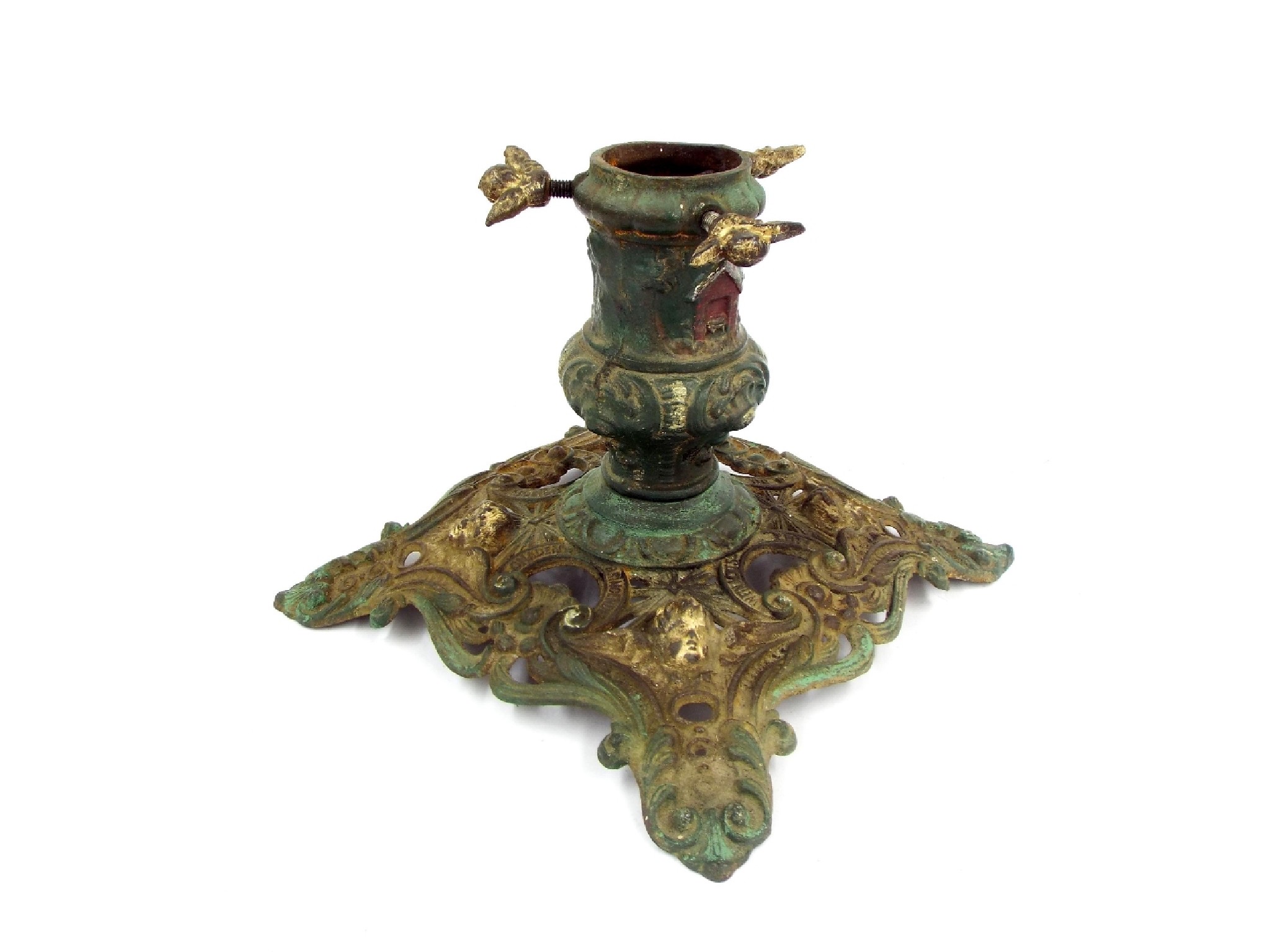 Appraisal: Victorian cast iron Christmas tree base decorated in relief with