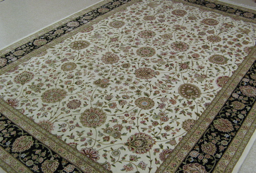 Appraisal: AN ORIENTAL SILK AND WOOL CARPET Persian Isfahan design of