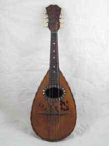 Appraisal: An Italian rosewood mandolin with boxwood stringing to body bone