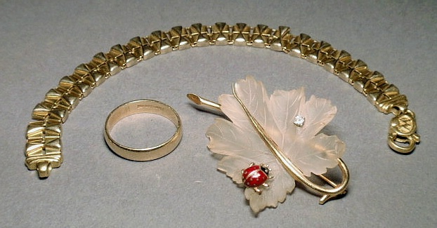 Appraisal: Group of jewelry- Tiffany k gold ladybug and leaf brooch