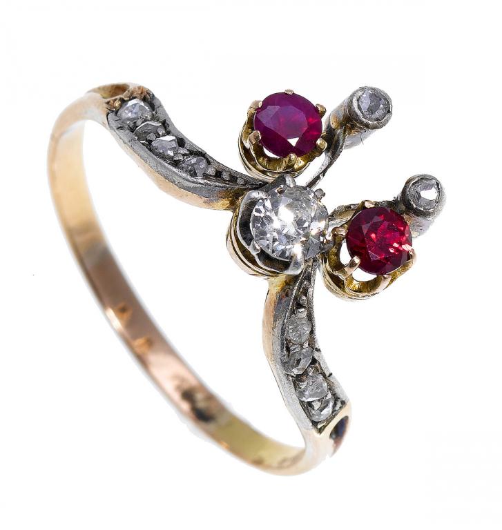 Appraisal: A RUBY AND DIAMOND RING of 'tied' design with one