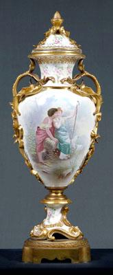 Appraisal: Monumental Sevres porcelain urn hand painted scenes with youthful shepherds