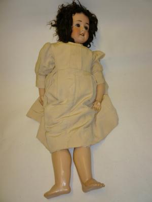 Appraisal: A Schoenau Hofmeister bisque head girl doll cracked head with