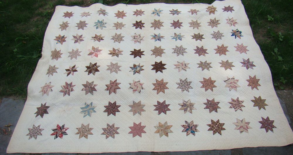 Appraisal: APPLIQUE QUILT Late th Early th CenturyIn multi-star design x