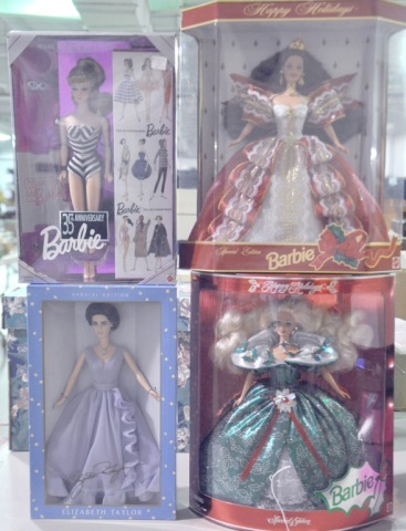 Appraisal: Three Collectible BarbiesBy Mattel Including Holiday Barbie Holiday Barbie and