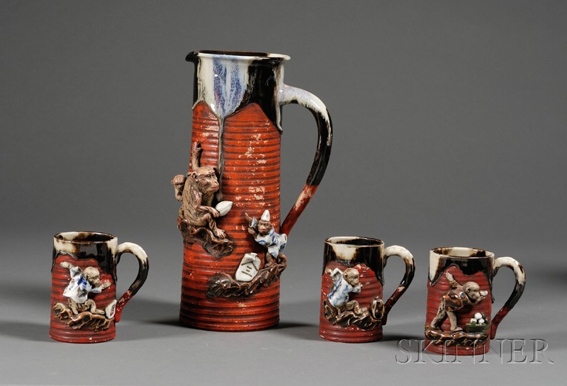 Appraisal: Pottery Pitcher and Cup Set Japan early th century Sumidagawa