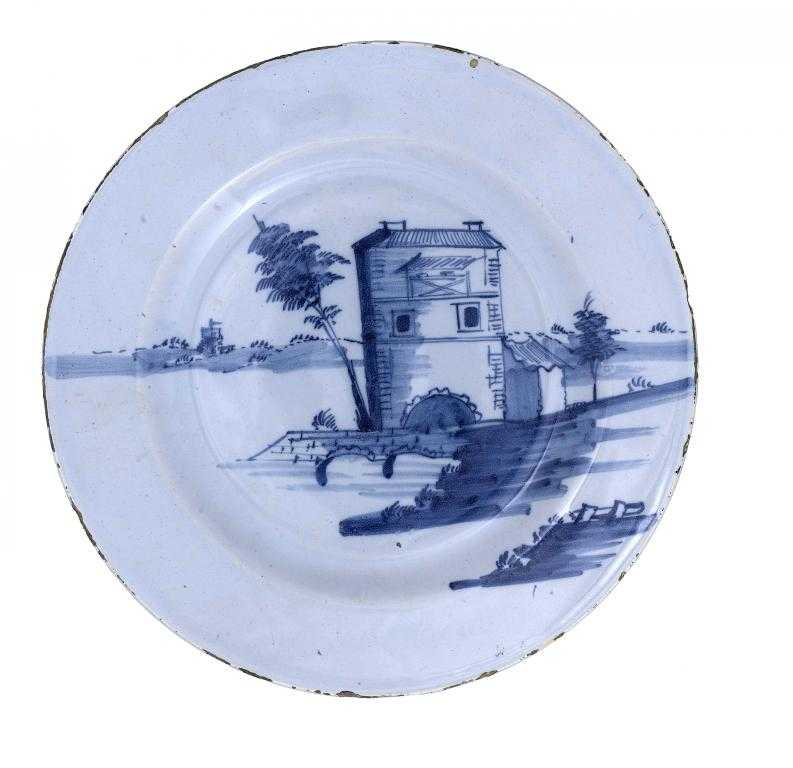 Appraisal: AN ENGLISH DELFTWARE PLATE POSSIBLY LIVERPOOL painted in cobalt with