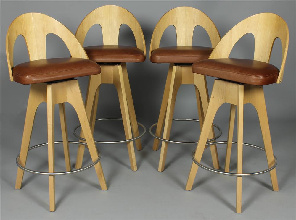 Appraisal: FOUR CUSTOM CONTEMPORARY SWIVEL BAR STOOLS curved pierced back above