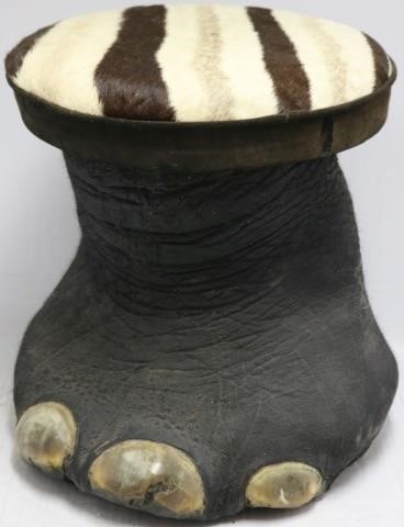 Appraisal: EARLY TH C ELEPHANT FOOT FOOTSTOOLWITH ZEBRA FUR FABRIC ON