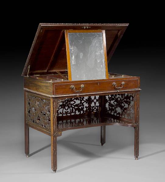 Appraisal: A George III carved mahogany gentleman's dressing table late th