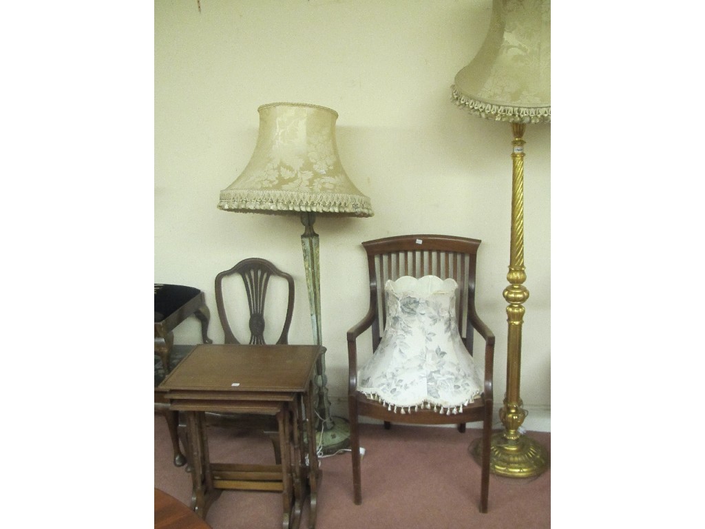 Appraisal: Two floor lamps with shades mahogany nest of tables parlour