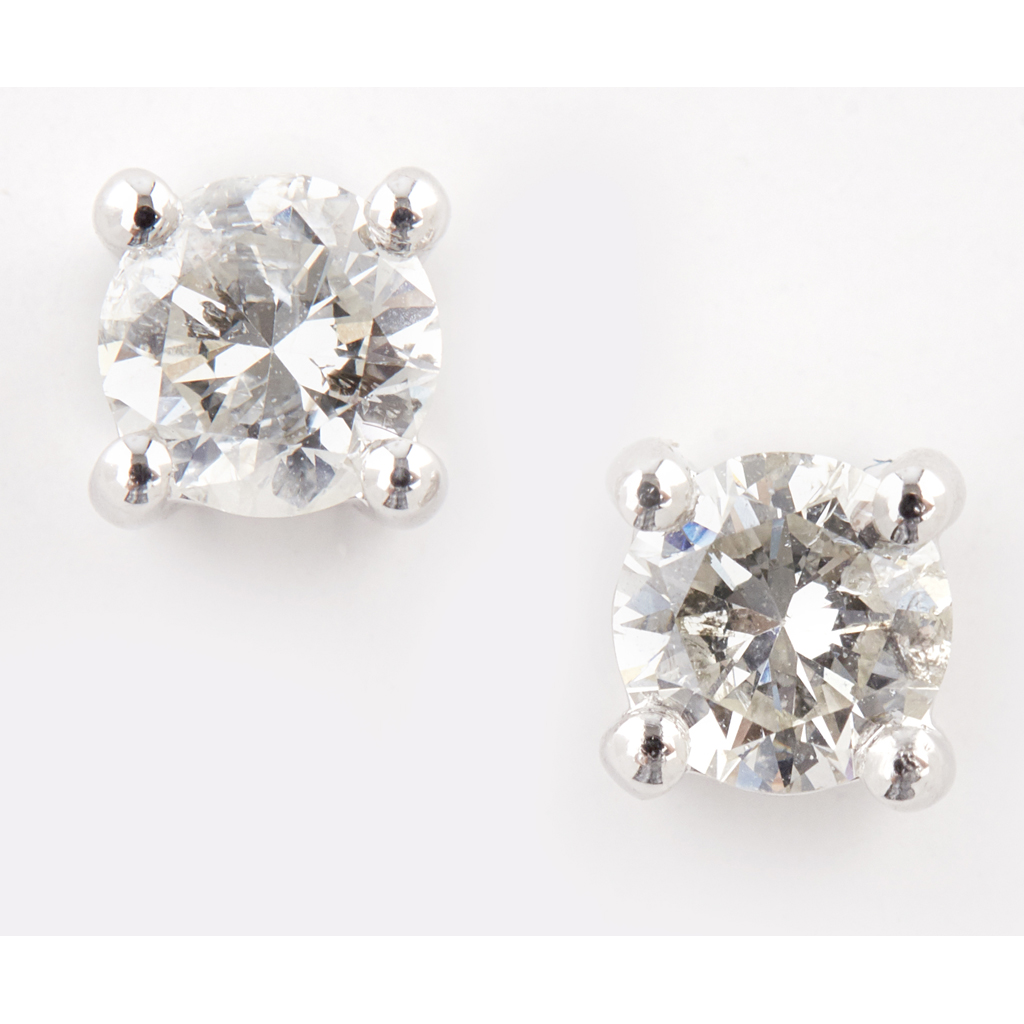 Appraisal: A pair of diamond set stud earrings each claw set