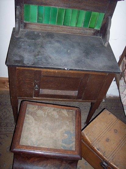 Appraisal: An Edwardian oak washstand with tiled splashback cm wide a