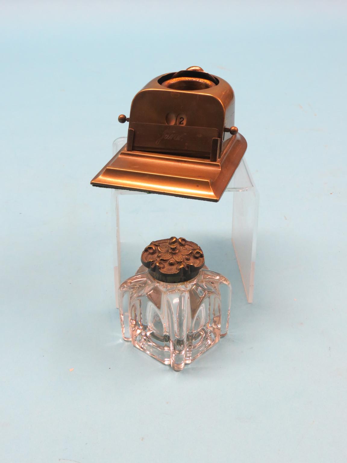 Appraisal: A brass desk-top calendar inkwell glass liner lacking and a