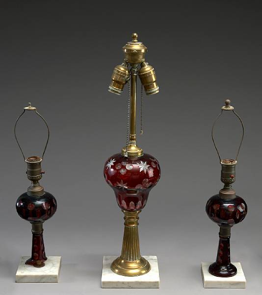 Appraisal: Three American ruby cased and cut to clear glass brass