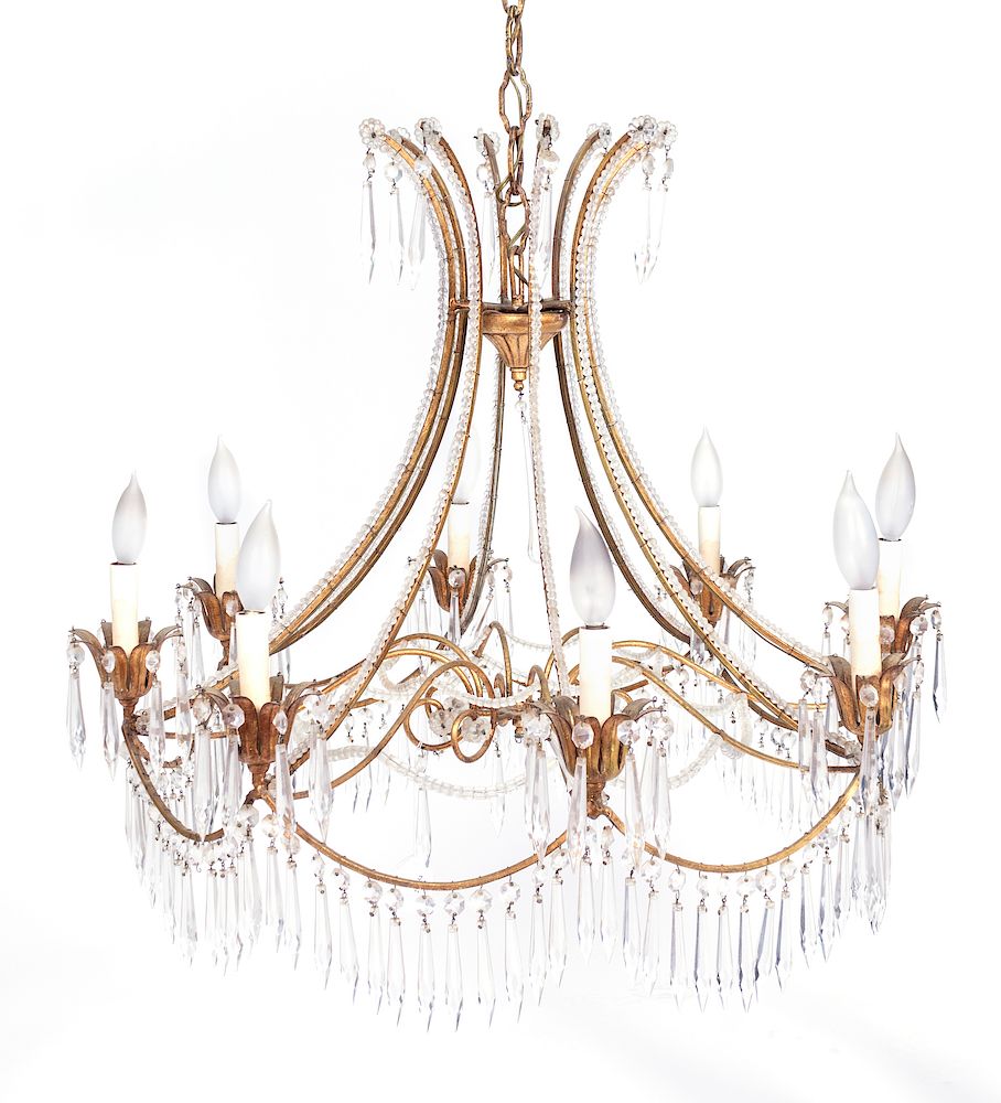 Appraisal: A Regency Style Gilt Metal and Crystal Eight-Light Chandelier TH