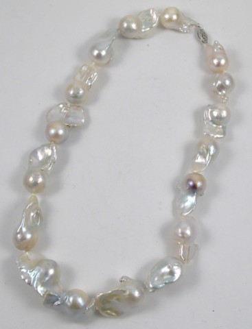 Appraisal: FRESHWATER BAROQUE PEARL NECKLACE strung with white baroque pearls coming