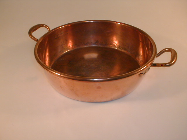 Appraisal: A Victorian copper two-handled pan diameter