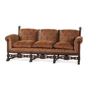 Appraisal: A Jacobean Style Carved Oak Sofa and Armchair th Century