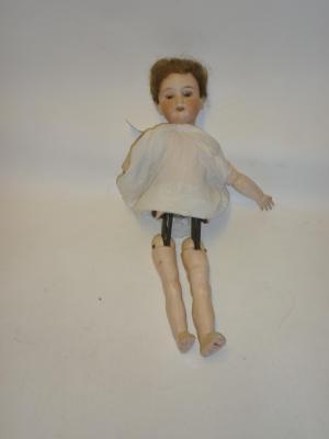 Appraisal: An Armand Marseille bisque head walking girl doll with blue