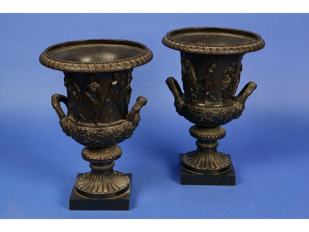 Appraisal: A PAIR OF GRAND TOUR BRONZE URNS based on the