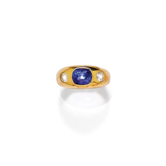 Appraisal: SAPPHIRE AND DIAMOND RING Yellow gold g Casual solid band