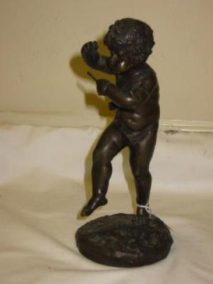 Appraisal: A BRONZE FIGURE of a dancing putto with pan pipes