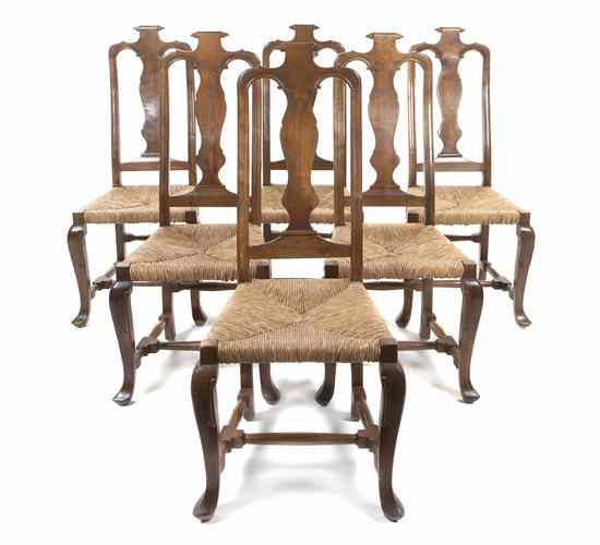 Appraisal: A Set of Ten American Carved Wood Dining Chairs having