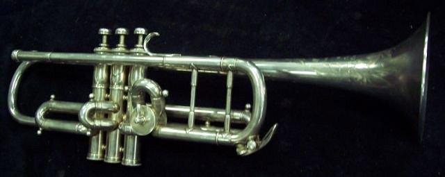 Appraisal: A cased trumpet 'The Clippertone Excelsior Sonorous' by Hawkes Son