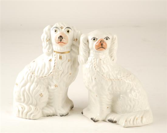 Appraisal: A Pair of Staffordshire Spaniels white with painted faces and