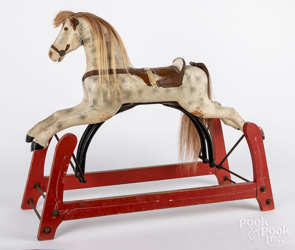 Appraisal: Wooden painted rocking horse Wooden painted rocking horse on a