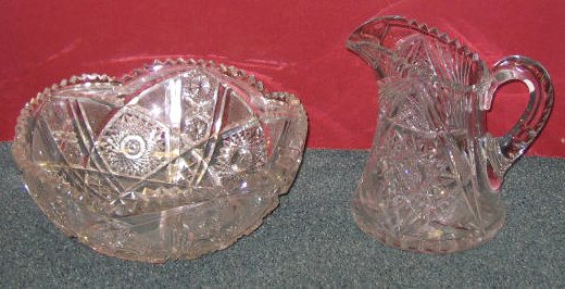 Appraisal: CUT GLASS FRUIT BOWL AND PITCHER Each piece cut with