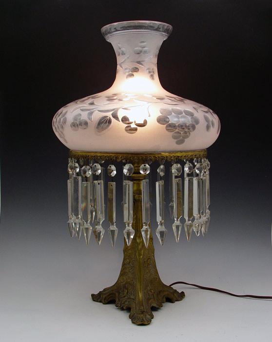 Appraisal: ASTRAL LAMP WITH CUT GLASS SHADE Cornelius type ornate brass